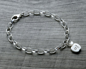 Personalized apple charm bracelet in sterling silver with lobster clasp