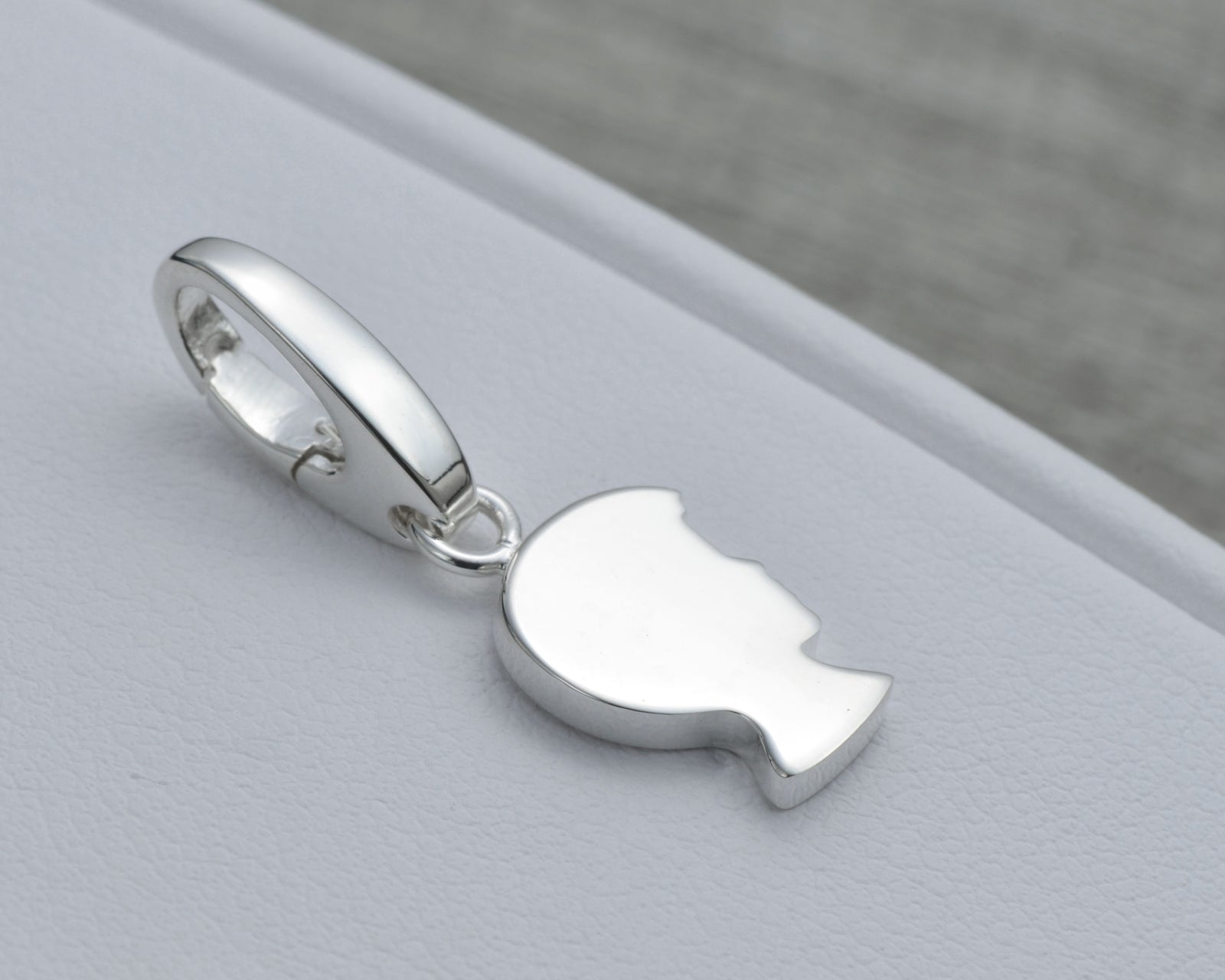BOY CHARM IN STERLING SILVER