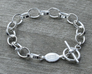 Charm bracelet with toggle clasp in sterling silver