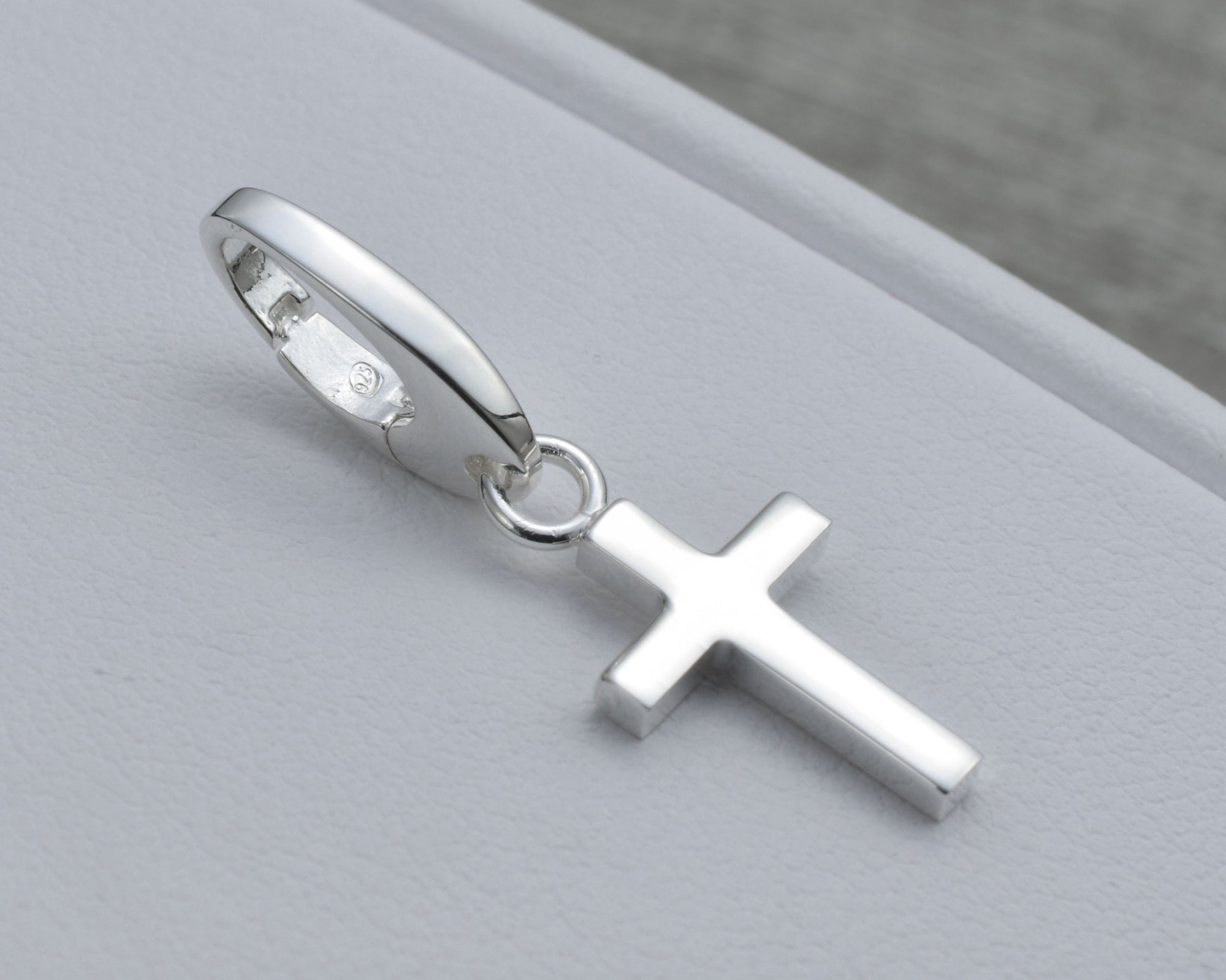 CROSS CHARM IN STERLING SILVER