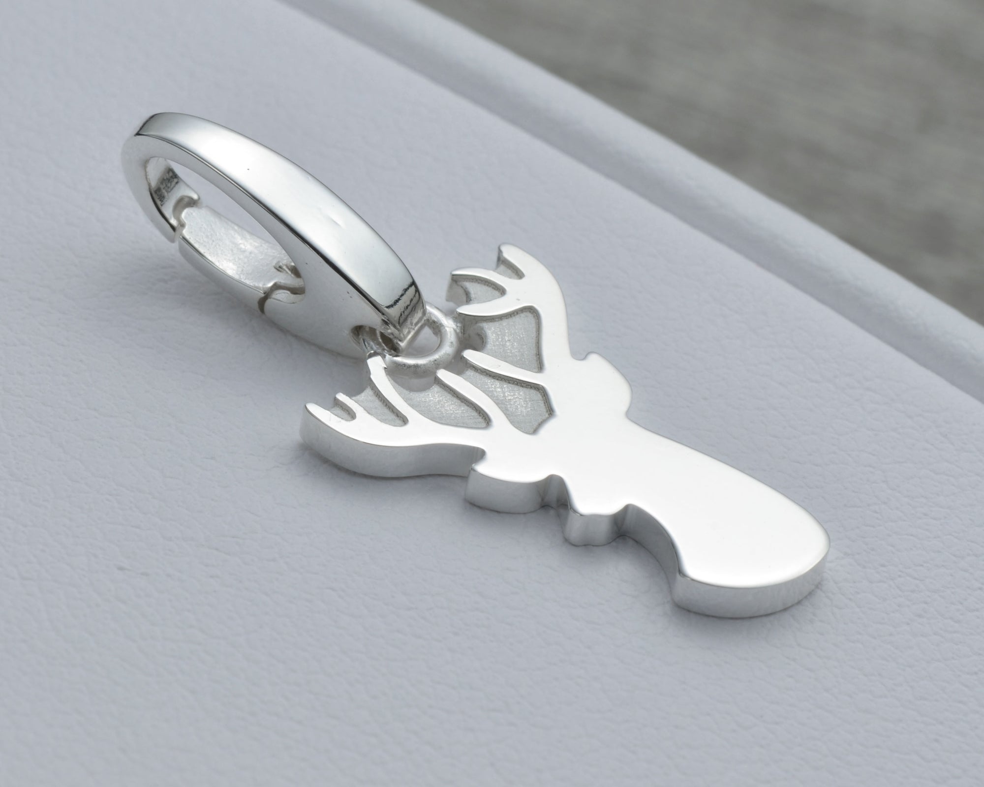 DEER CHARM IN STERLING SILVER