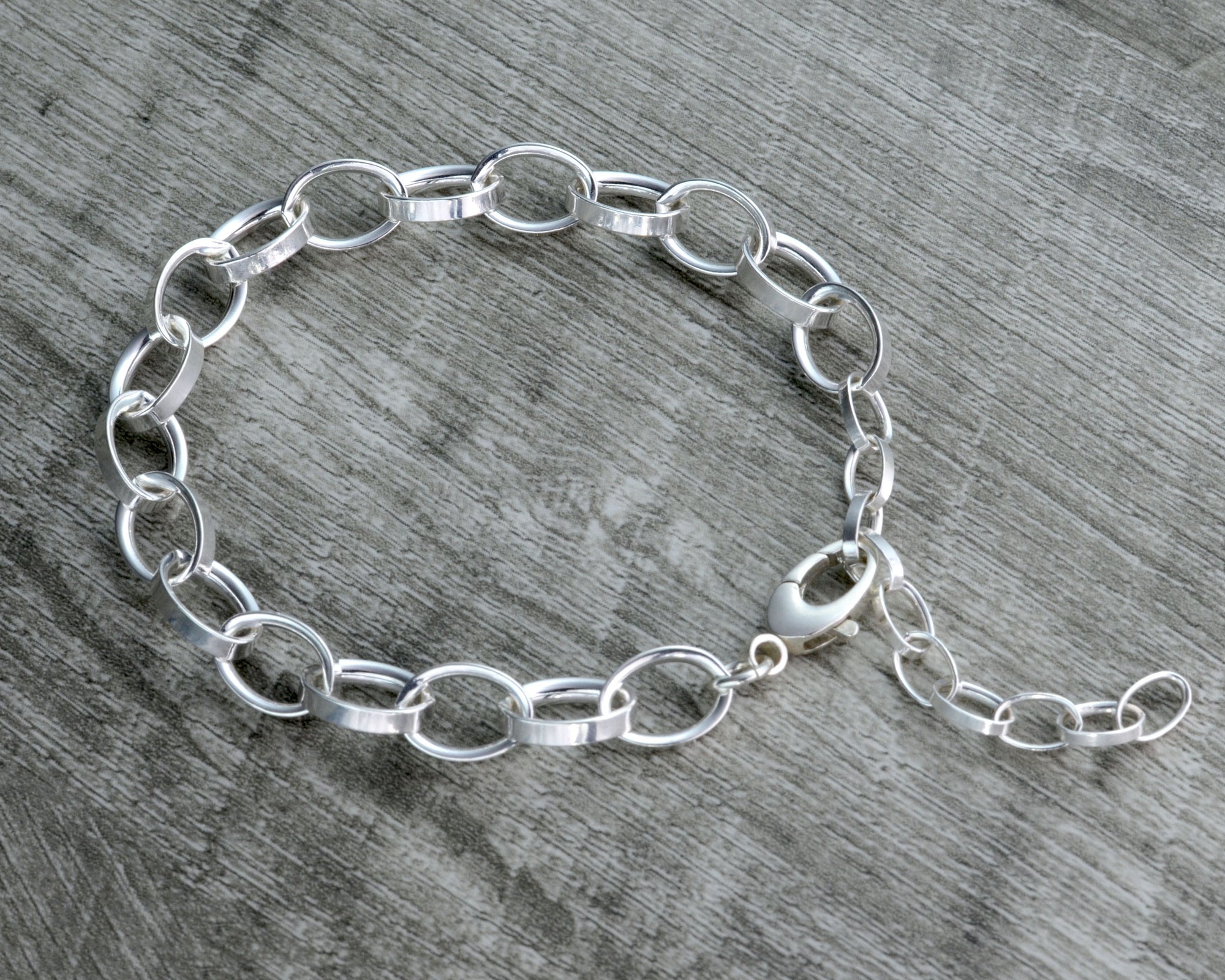 STERLING SILVER CHARM BRACELET WITH EXTENDER