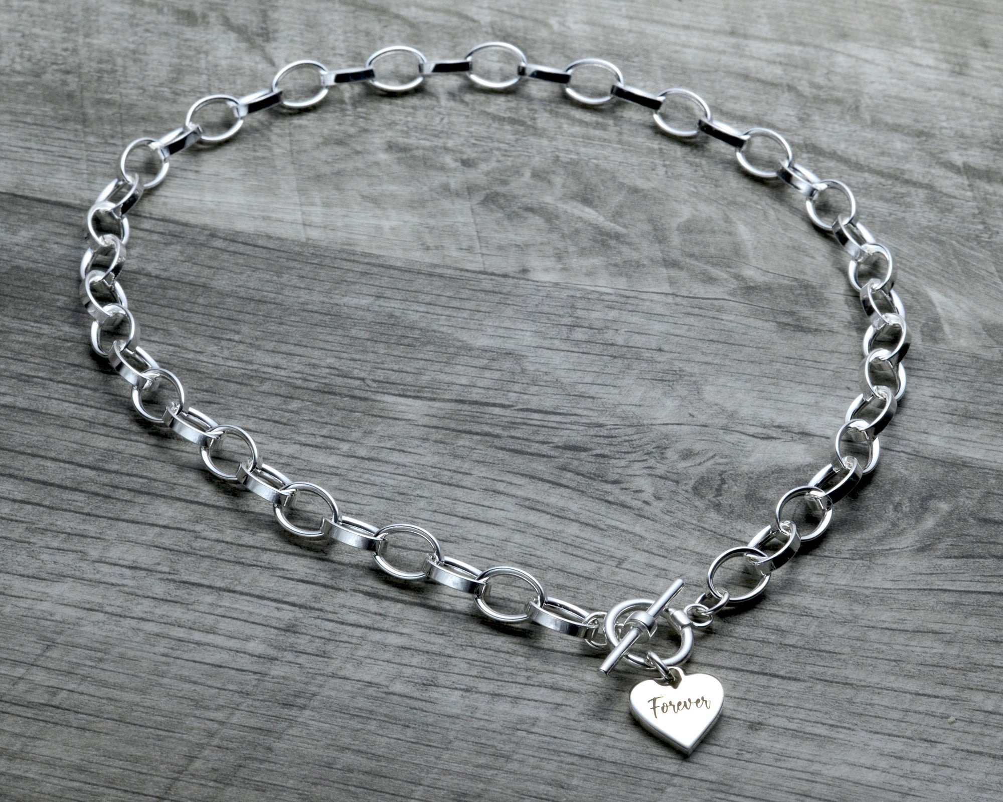 CHUNKY CHOKER NECKLACE WITH HEART TAG