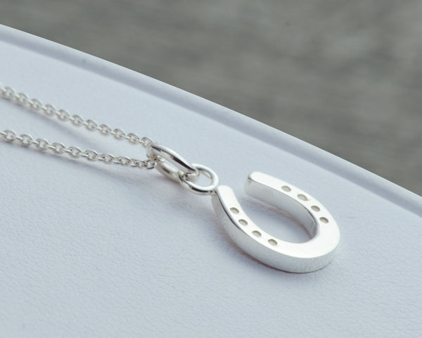 Silver Cubic Zirconia Horseshoe Pendant in White | Prouds