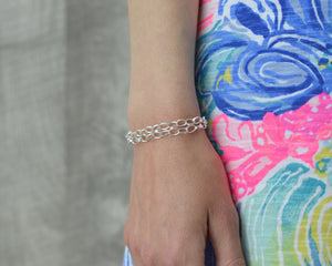 Layered charm bracelet