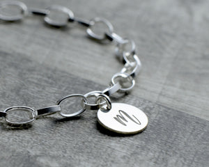 Engraved initial tag for sterling silver charm bracelet