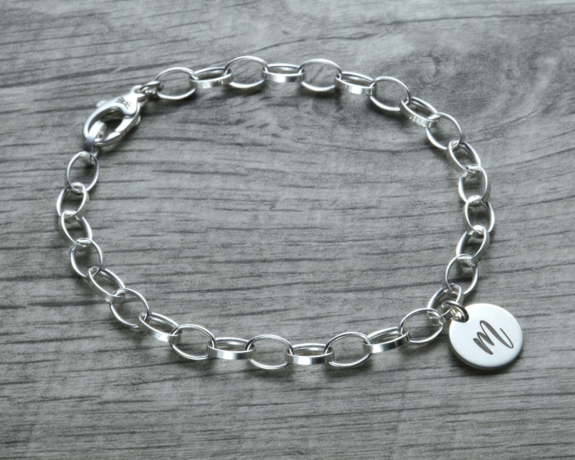 personalized initial charm bracelet in sterling silver with lobster clasp