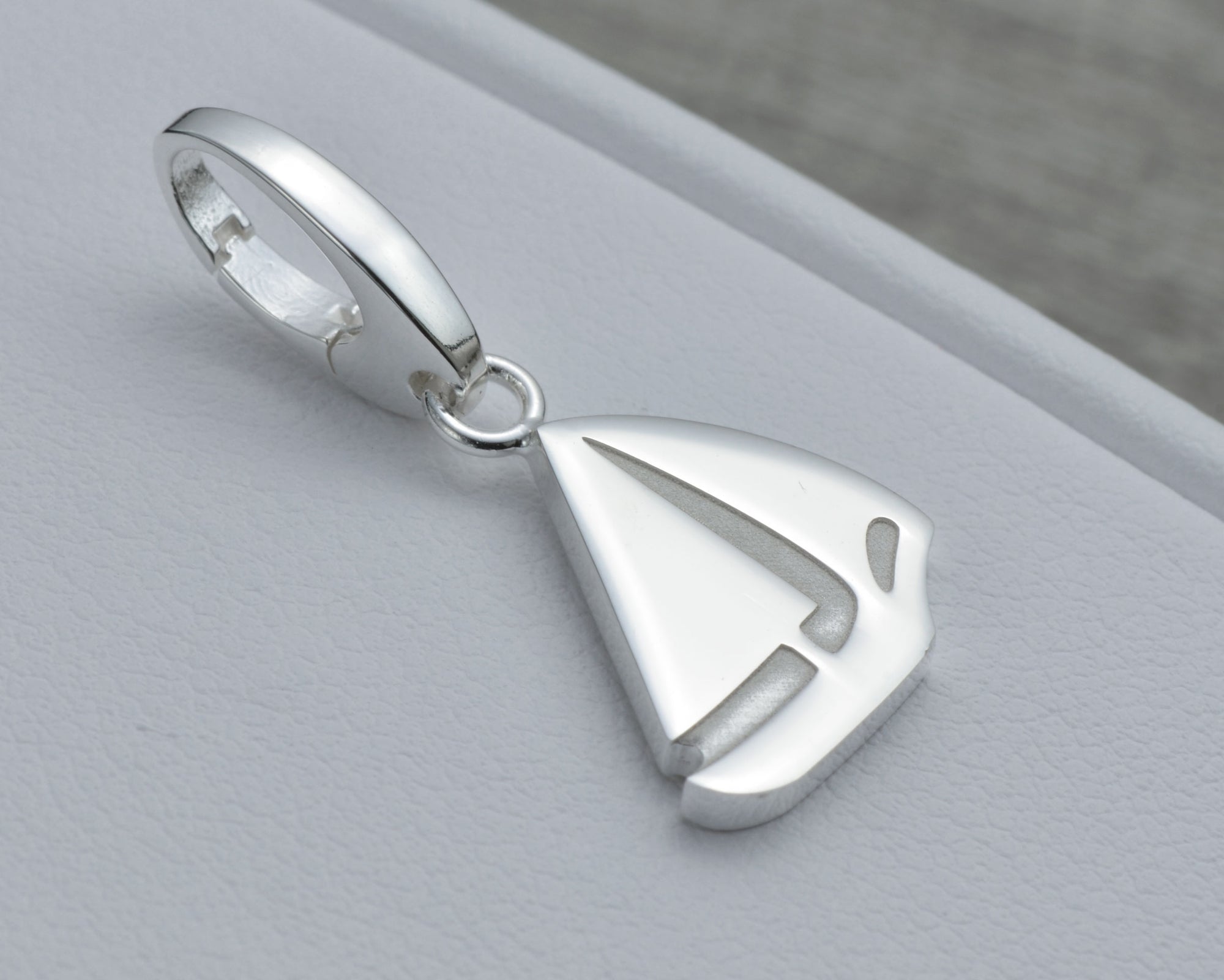 SAILING CHARM IN STERLING SILVER