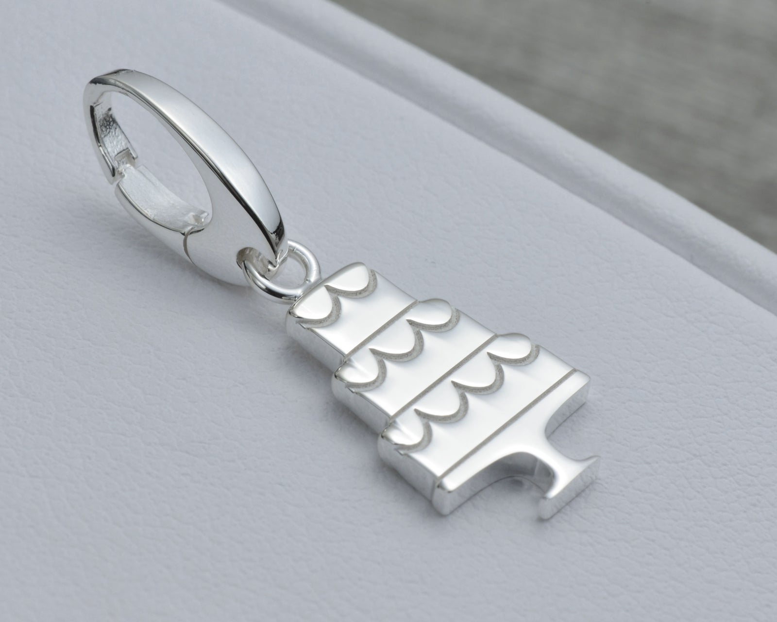 WEDDING CAKE CHARM IN STERLING SILVER