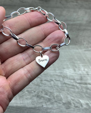 Personalized heart charm bracelet in sterling silver